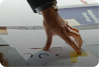 A professional reviewing performance charts